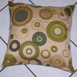 Circles cushion in green tones